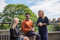 University staff on balcony